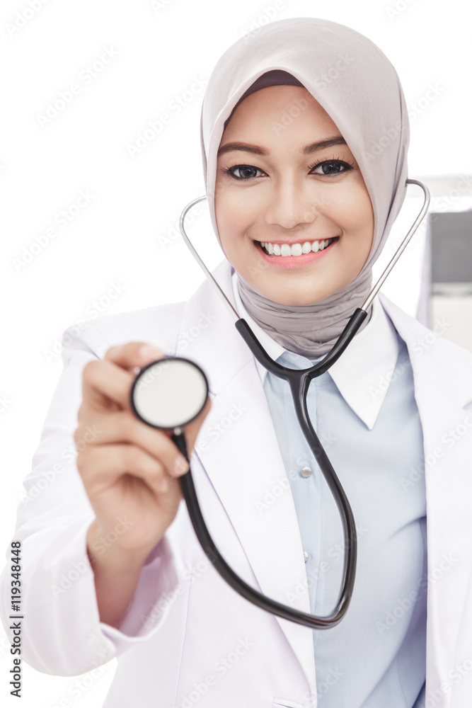 asian female doctor smiling while using stethoscope asian female doctor smiling while using stethoscope
