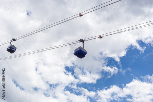 Pair of funicular cabin moving to top of mountains