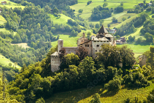 Amazing medieval castle of Presule in Dolomites mountains, Northern Italy  photo