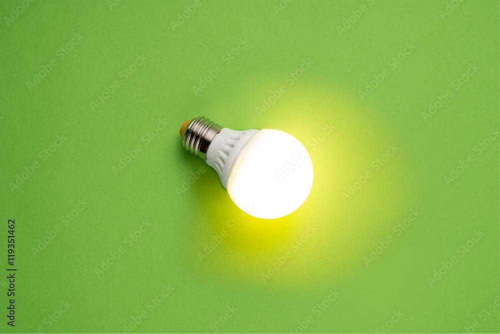 glass bulbs for lampson green background - idea concept glass bulbs for lampson green background - idea concept