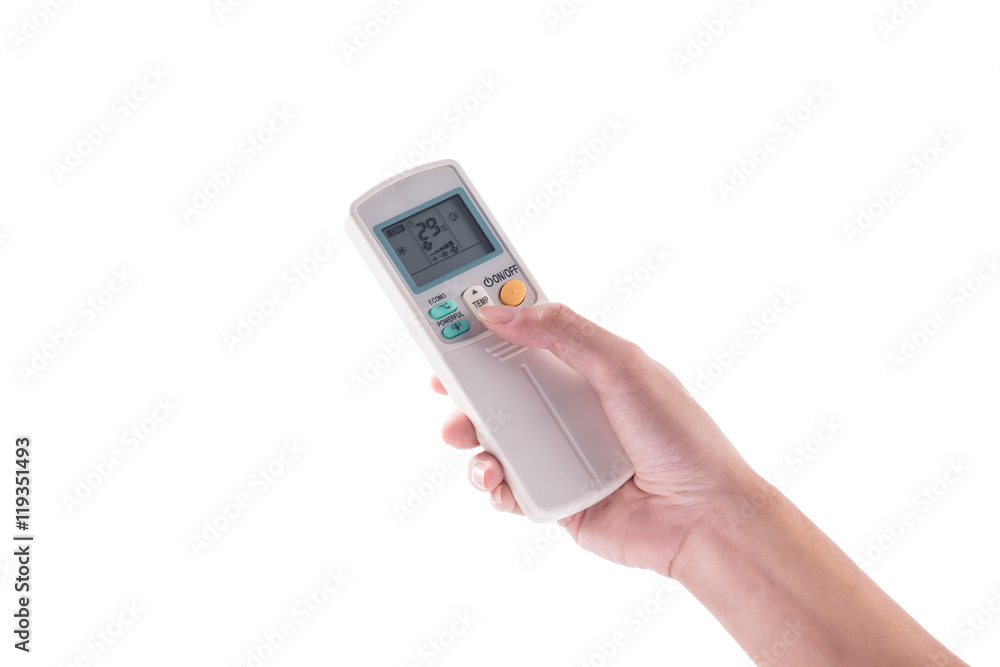 Right hand holding remote air conditioner turn up to 27 celcius Right hand holding remote air conditioner turn up to 27 celcius