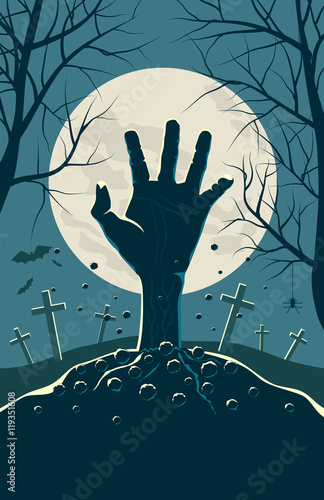 Zombie hand breaking out from under the ground