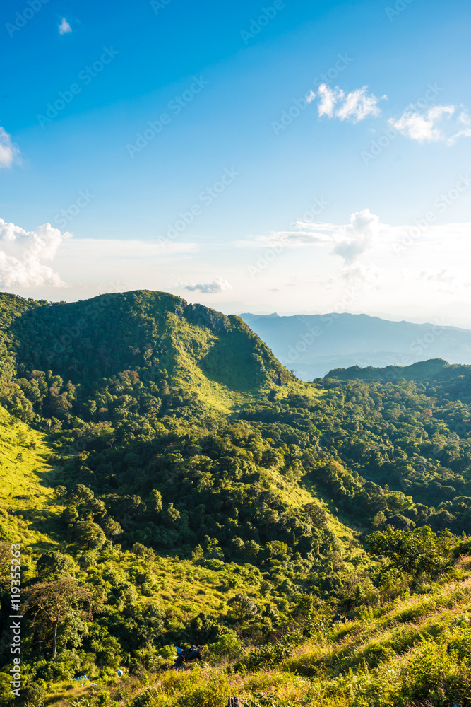 Obraz premium Green mountain rocky highland in morning with sun light