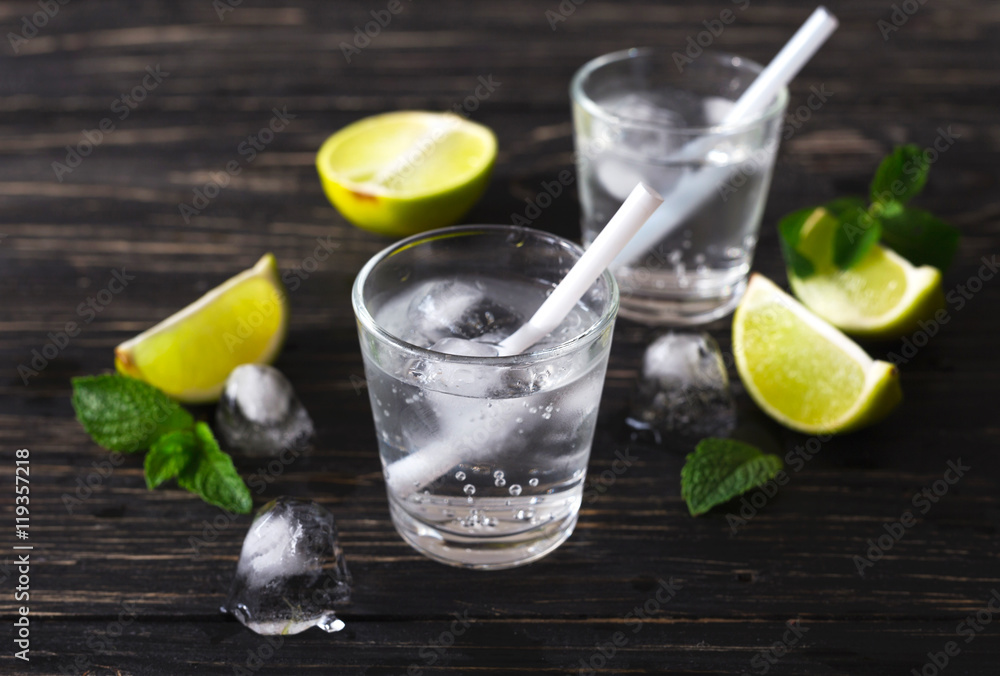 Fototapeta premium Cocktail with soda water, ice, lime and mint