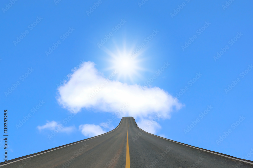 Lane blacktop isolated on blue sky with sunlight background.