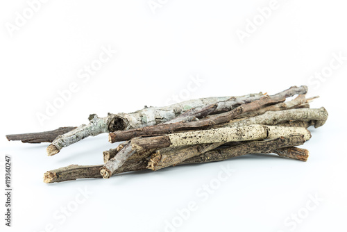 Pile of dry twigs on white background