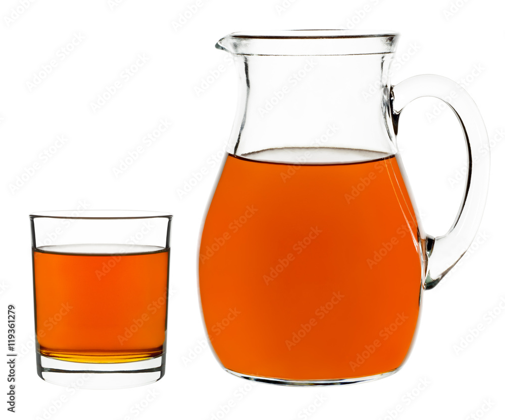 apple juice in a glass and carafe apple juice in a glass and carafe