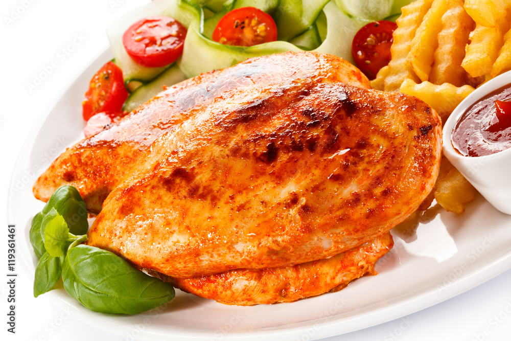 Grilled chicken fillets, boiled potatoes and vegetable salad Grilled chicken fillets, boiled potatoes and vegetable salad