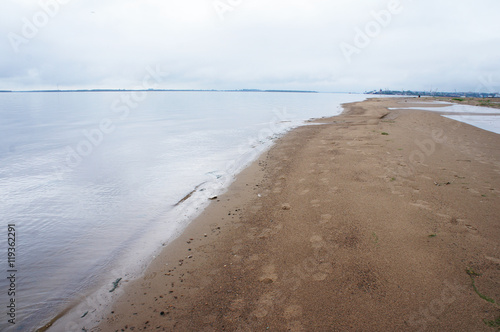 Sandy embankment of Northern Dvina river  Arkhangelsk  Russia