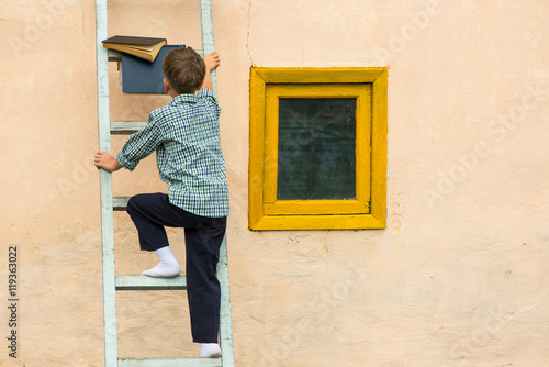 boy studying book