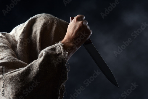  hooded man with knife