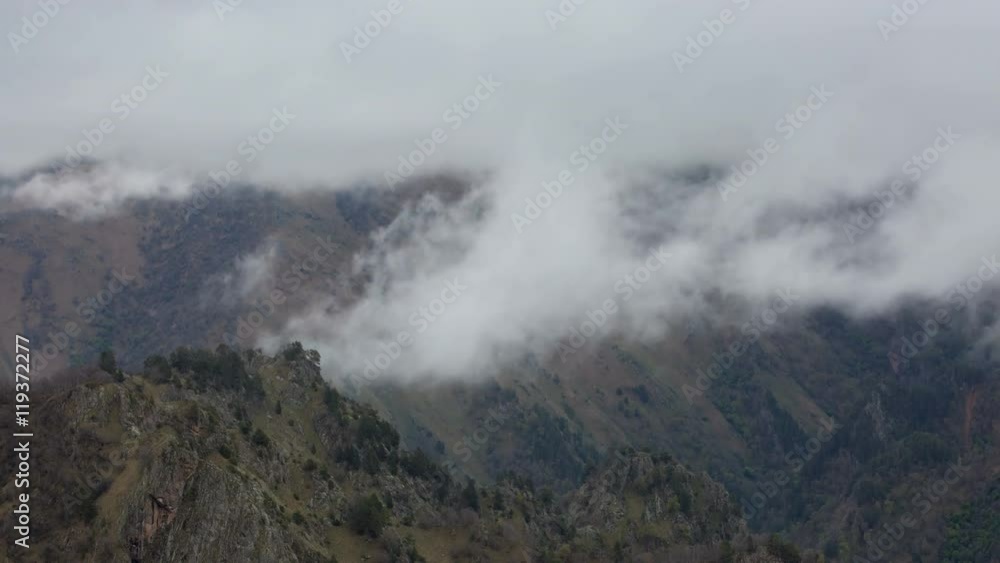 Russia, timelapse. The formation and movements of clouds up to the steep slopes of the mountains of Central Caucasus peaks. Russia, timelapse. The formation and movements of clouds up to the steep slopes of the mountains of Central Caucasus peaks.