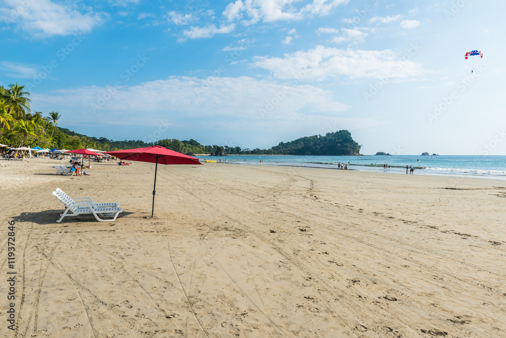 Parasol with chairs at Playa Espadilla at Manuel Antonio Park - Costa Rica Parasol with chairs at Playa Espadilla at Manuel Antonio Park - Costa Rica