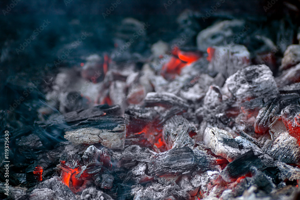 embers for cooking kebabs with ash and little lights
