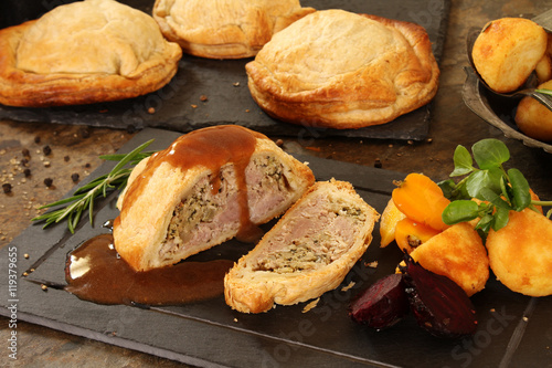 pork wellington roast dinner photo