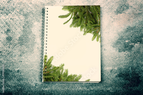 New Year background Christmas tree abstract gray background notebook for notes natural stone Grange vintage retro