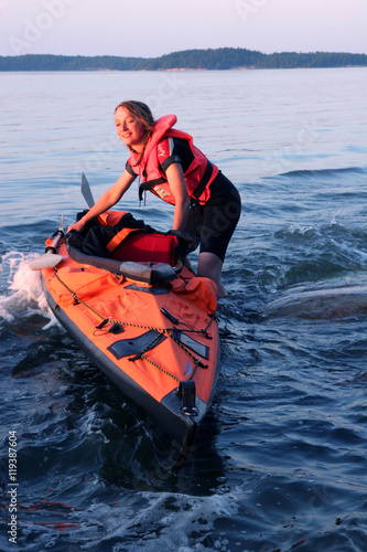 Female kayaker in the Baltic Sea, Sweden