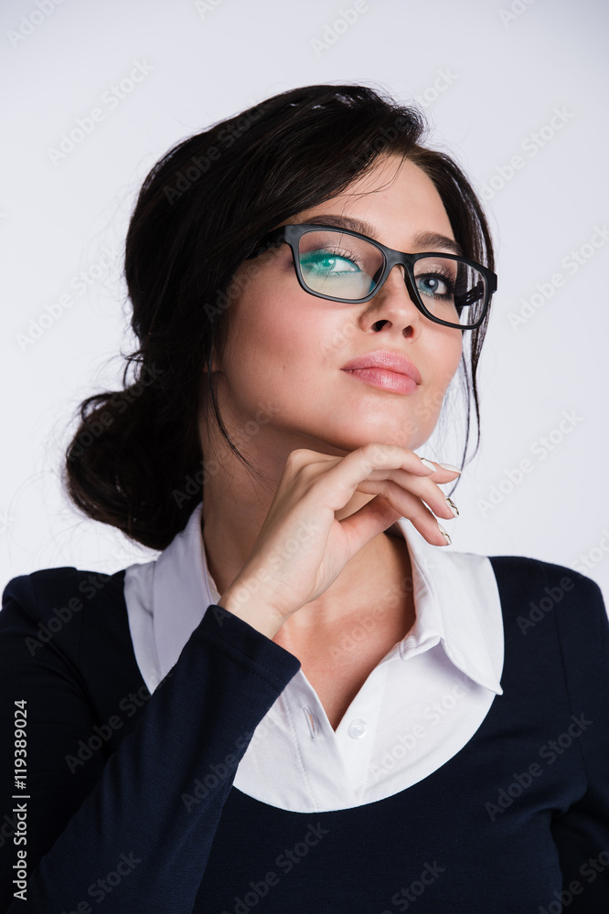 Attractive young business woman in glasses close-up portrait Attractive young business woman in glasses close-up portrait