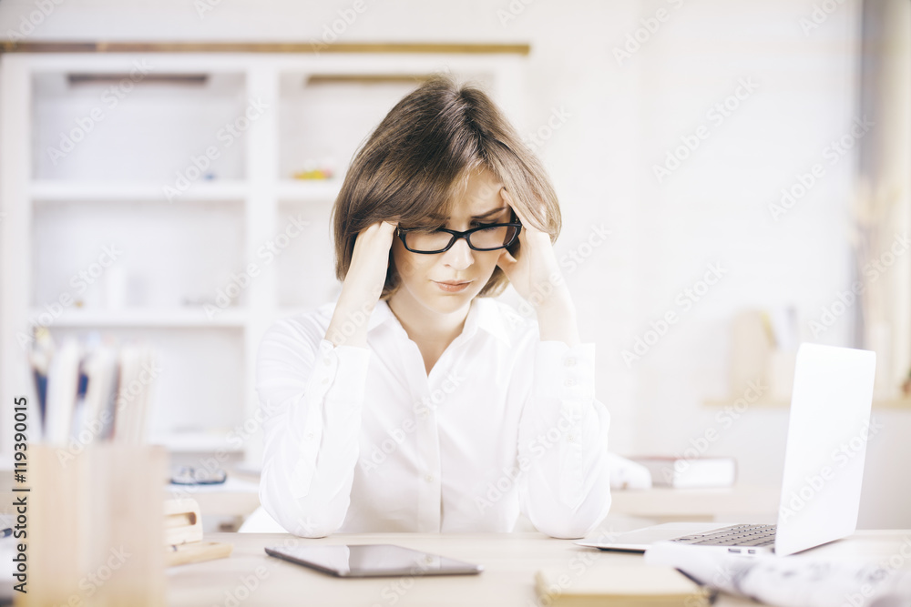 Businesswoman with headache Businesswoman with headache