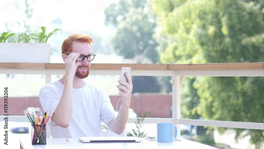 Online Video Chat on Smartphone, Sitting in Balcony of Office Outdoor Online Video Chat on Smartphone, Sitting in Balcony of Office Outdoor