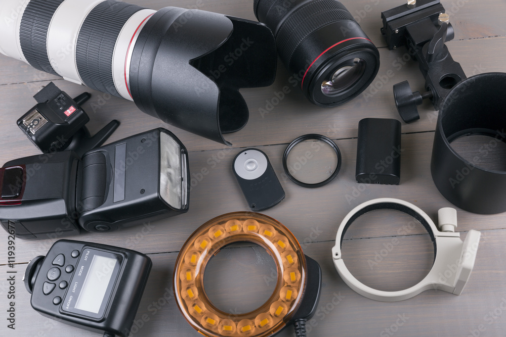 camera photo lenses and equipment on wooden background - obrazy, fototapety, plakaty 
