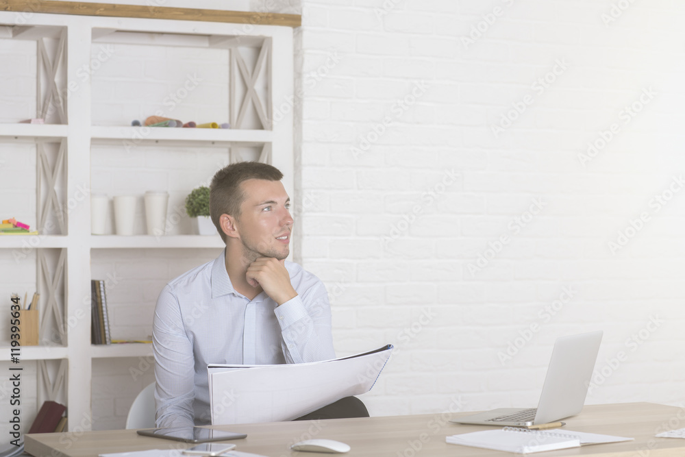 Young businessman with paperwork Young businessman with paperwork