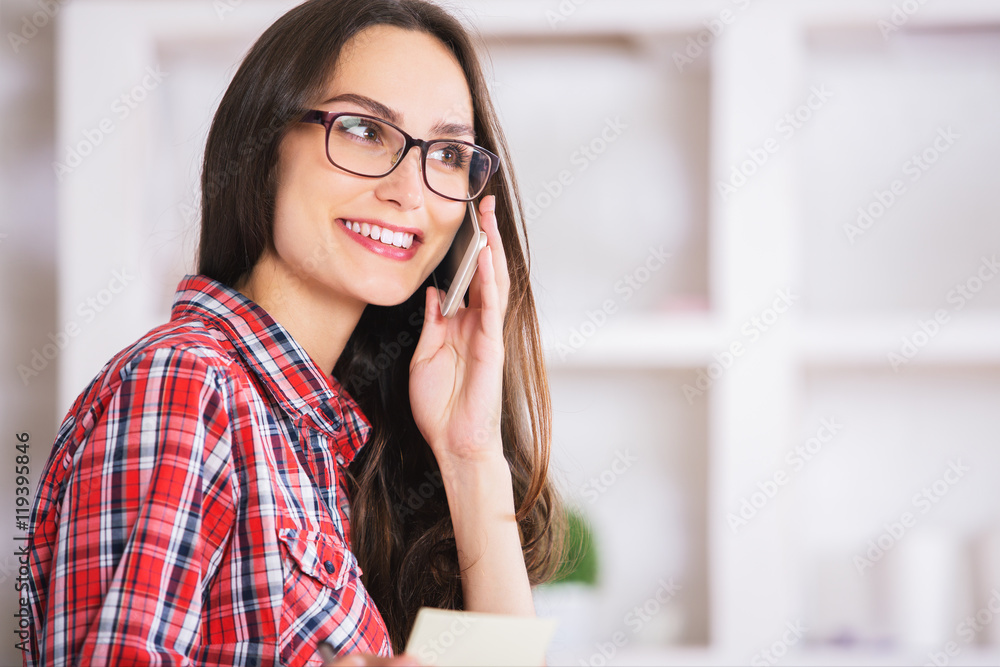 Cheerful woman on mobile phone Cheerful woman on mobile phone
