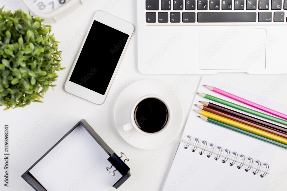 Smartphone and supplies on desktop Smartphone and supplies on desktop