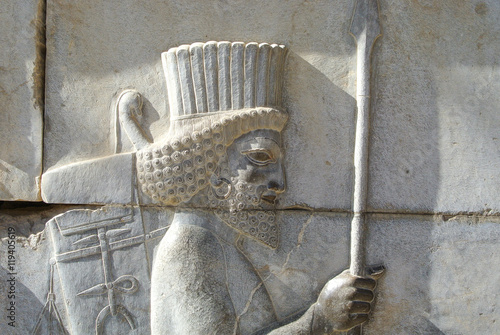 Close-Up of an Ancient Achaemenid Soldier in Persepolis, Iran photo