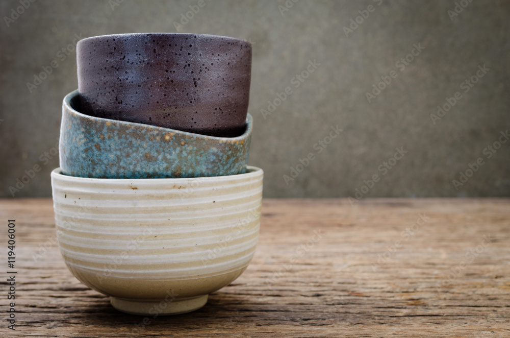 Empty bowl on rustic wood, Japanese handmade ceramic bowl,  ceramic texture - obrazy, fototapety, plakaty 