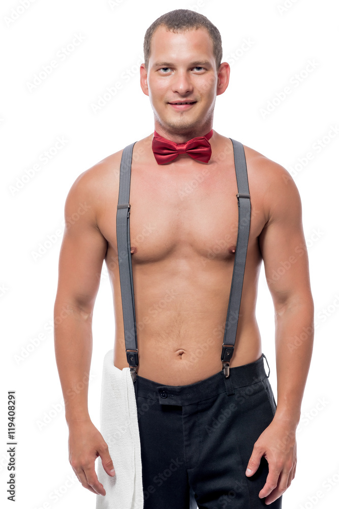 Fototapeta premium portrait of a waiter in a bow tie and suspenders on a white back