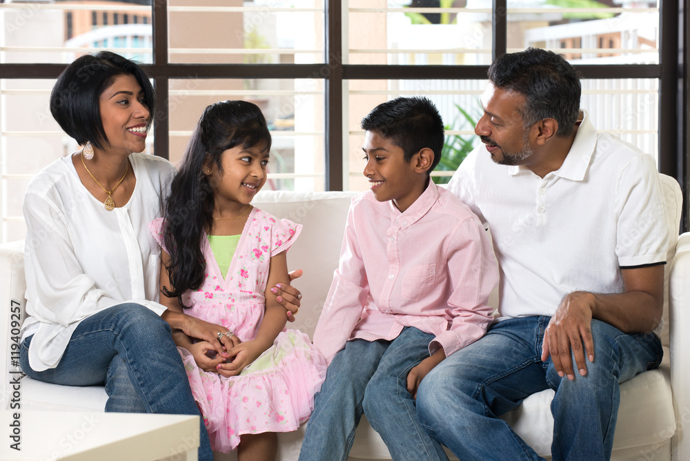happy indian family at living room happy indian family at living room