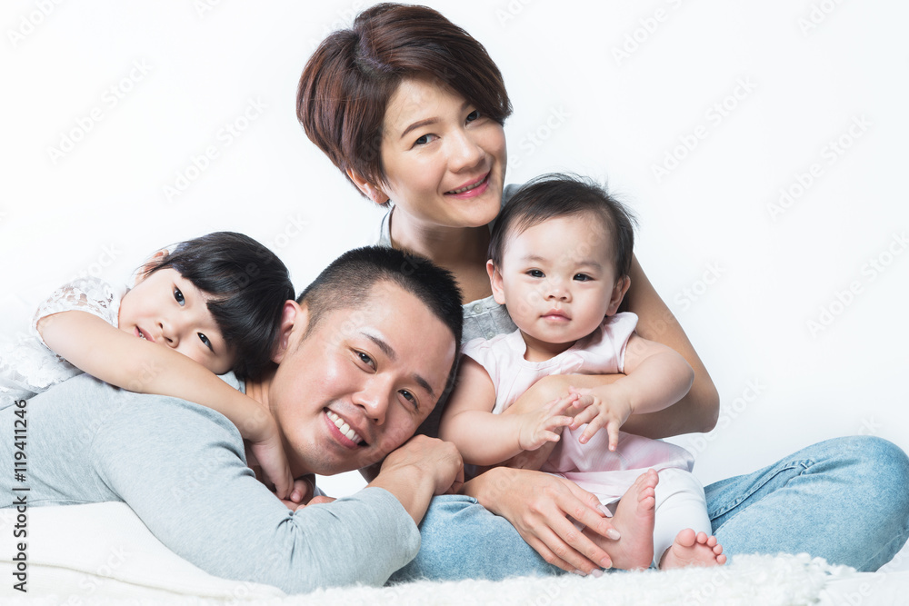 Young happy Asian family.