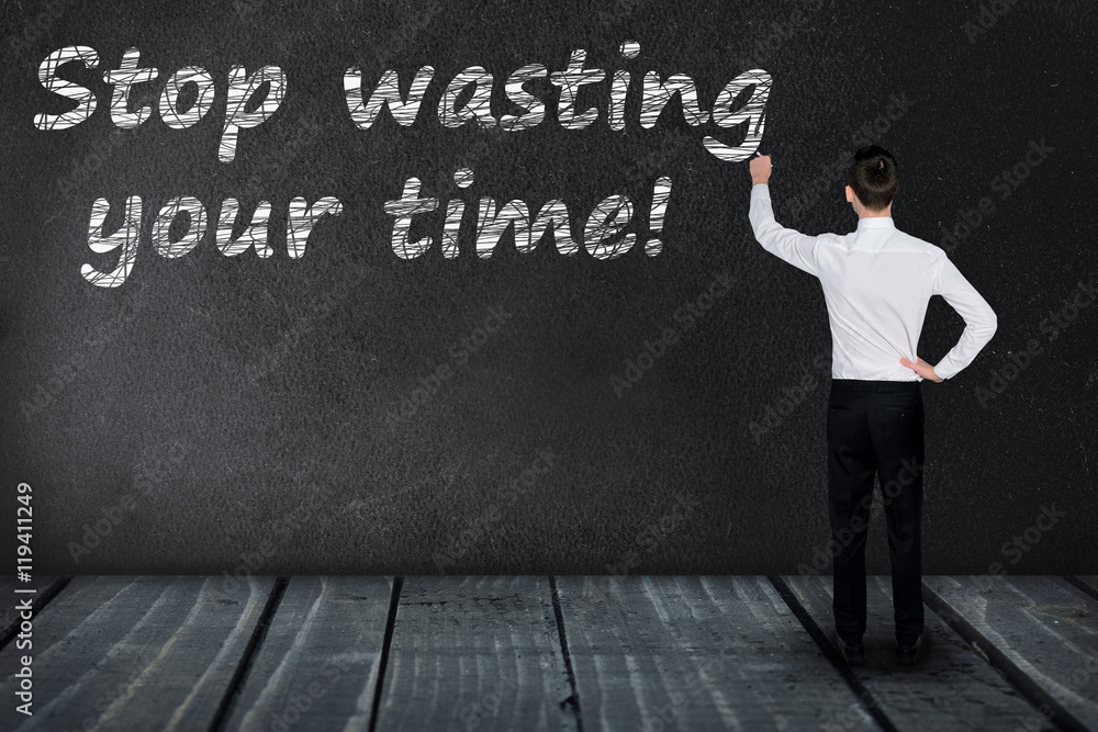 Stop wasting your time text on black board Stop wasting your time text on black board