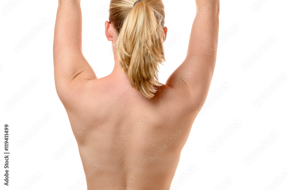 Fototapeta premium Back of a fit young woman with raised arms