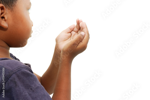 Hand of child praying