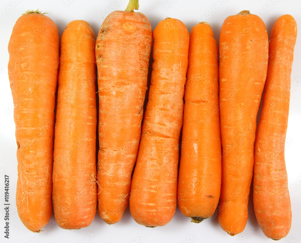 Pile of Fresh carrots on a white background Pile of Fresh carrots on a white background