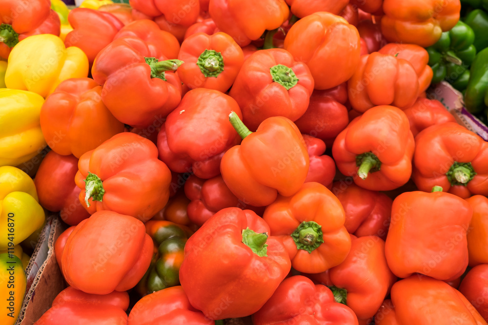 Red orange bell pepperss for sale at the city farmers market Red orange bell pepperss for sale at the city farmers market