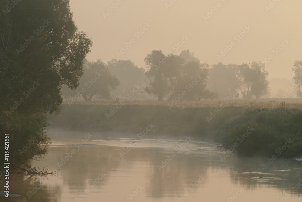 Misty sunset on the river