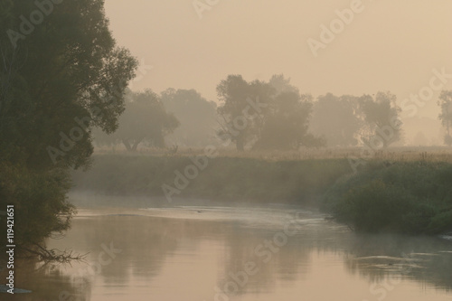 Misty sunset on the river