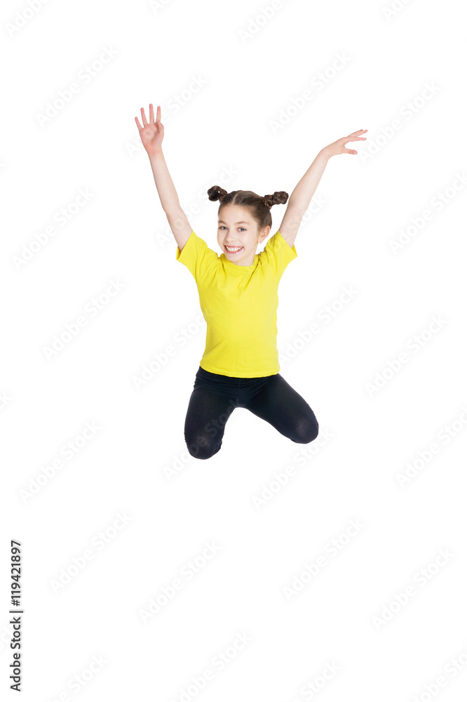 portrait of cute little girl jumping 