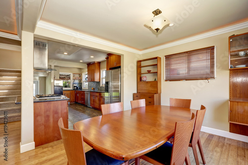 Craftsman kitchen and dining combo with soft beige walls