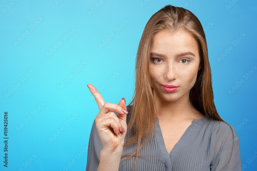 smiling young woman pointing smiling young woman pointing
