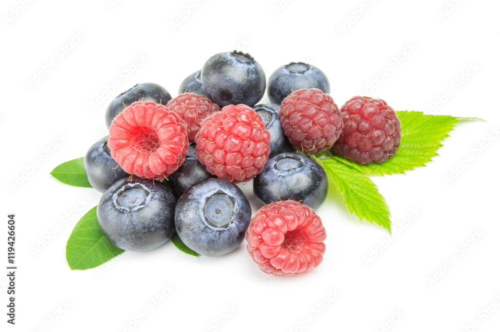 Ripe raspberry with blueberry isolated on white