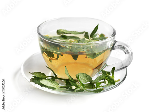Cup of sage tea isolated on white