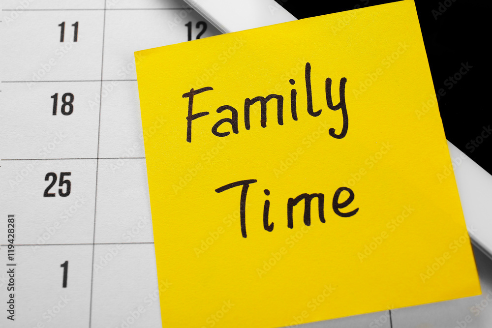 Note with text FAMILY TIME, closeup Note with text FAMILY TIME, closeup