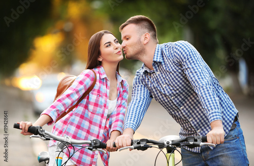 Young lovely couple riding ...