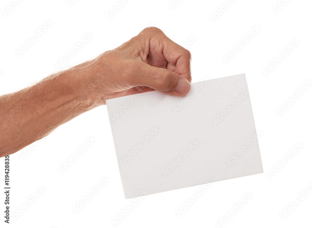Old man hand holding sheet of paper on a white background Old man hand holding sheet of paper on a white background
