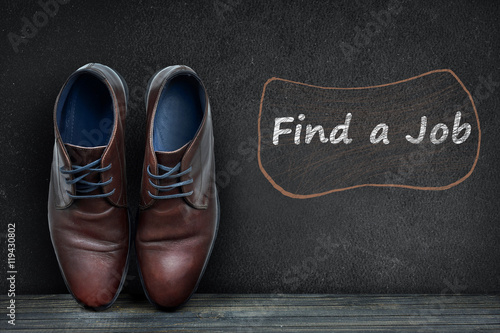 Find a job text on black board and business shoes