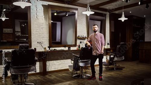 Mens hairdresser at workplace in the Barber shop photo